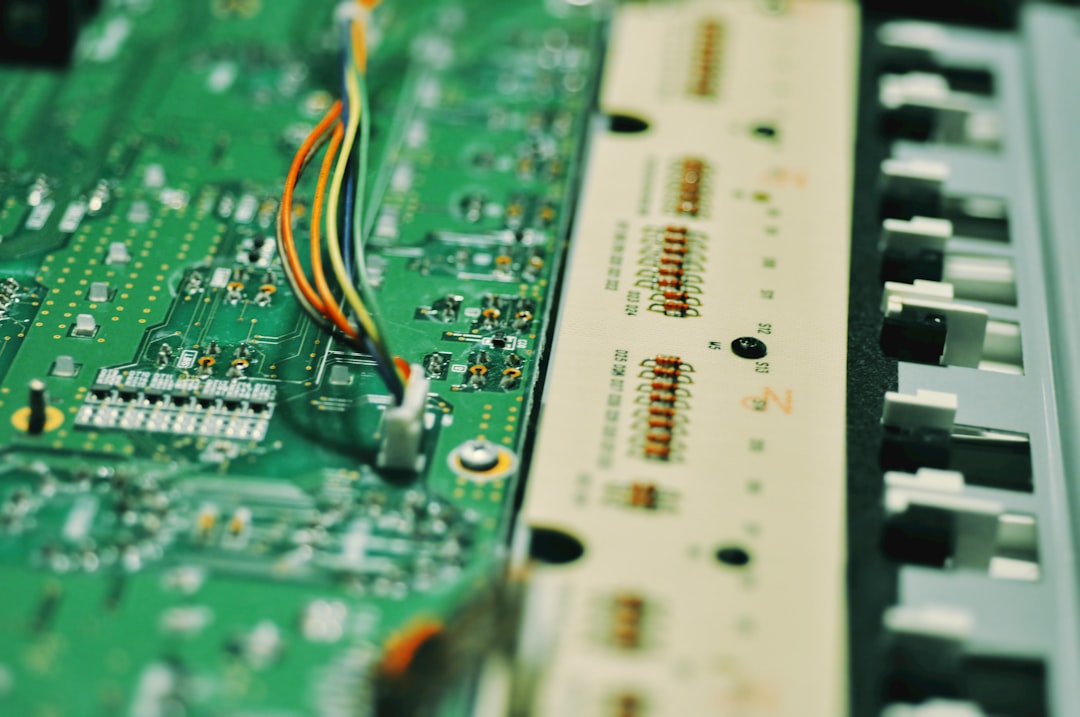 a close up of a circuit board with wires