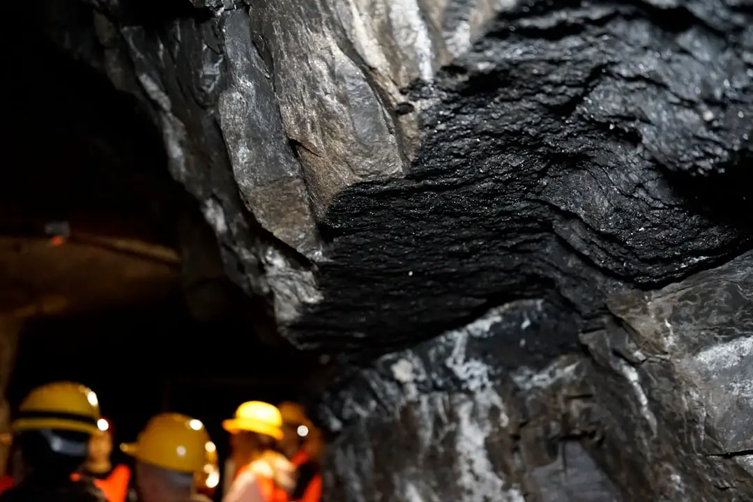 a group of people standing in a cave