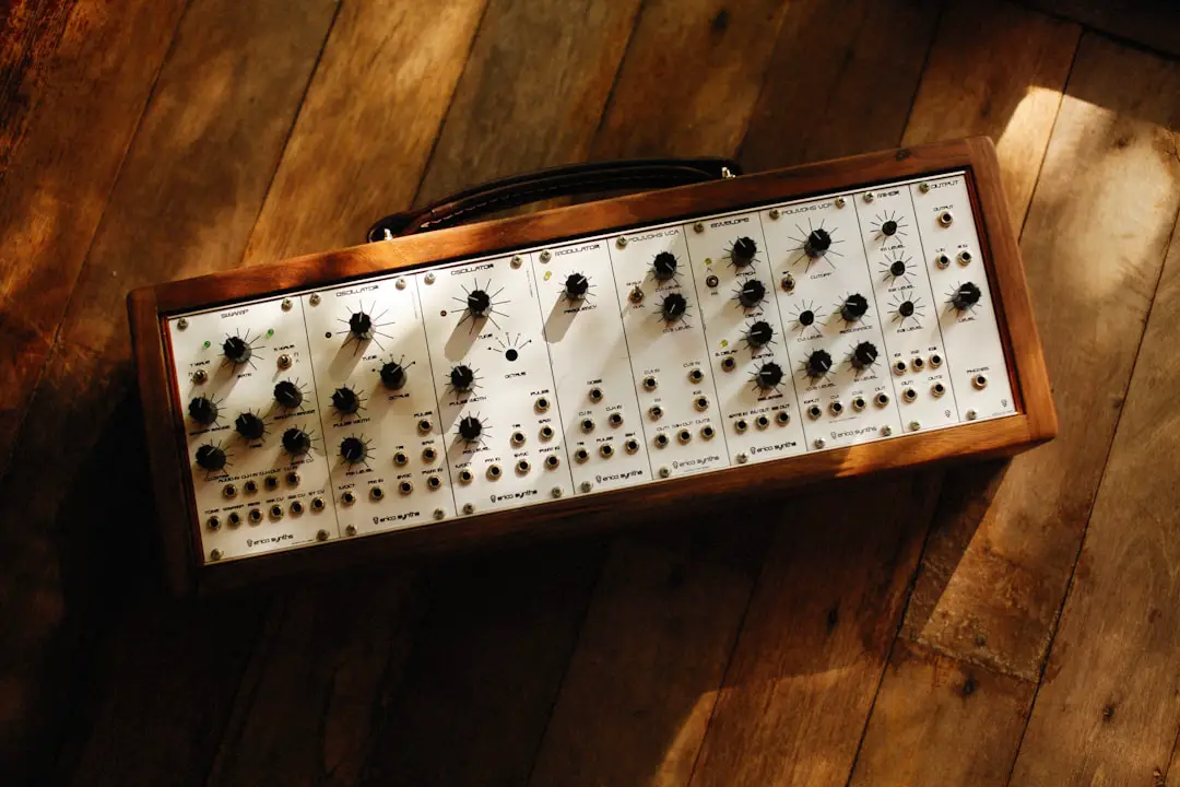 a close up of a sound board on a wooden floor