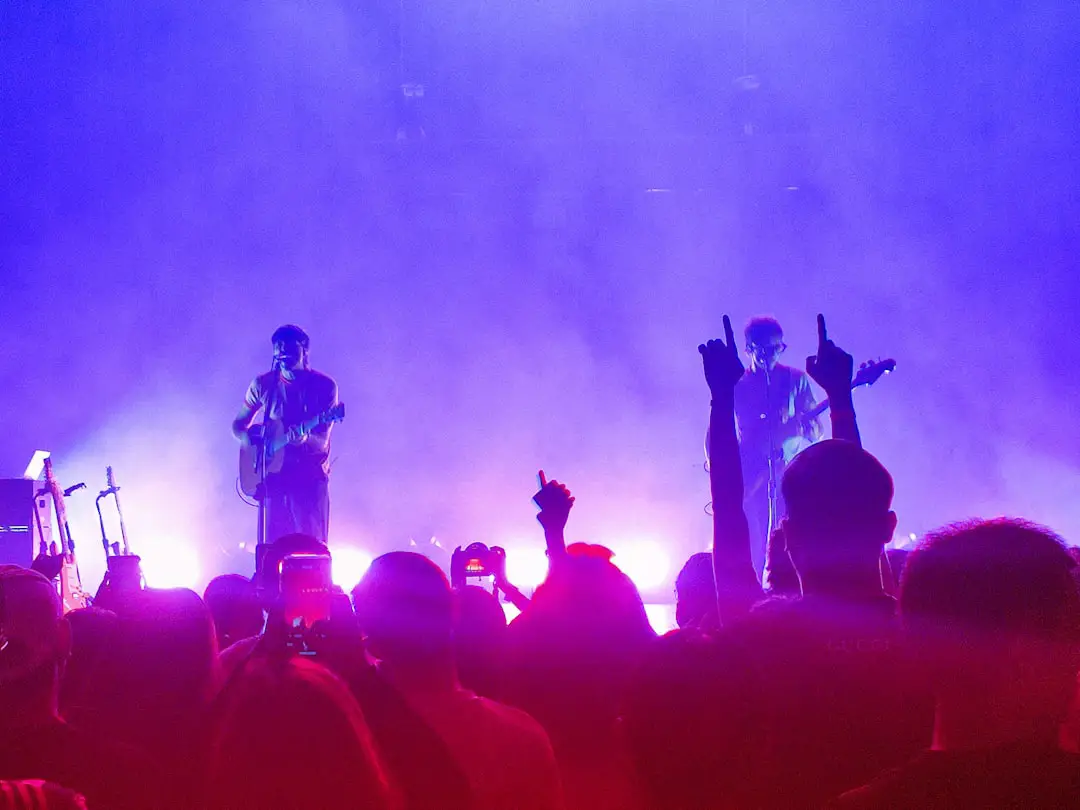 a group of people standing on top of a stage