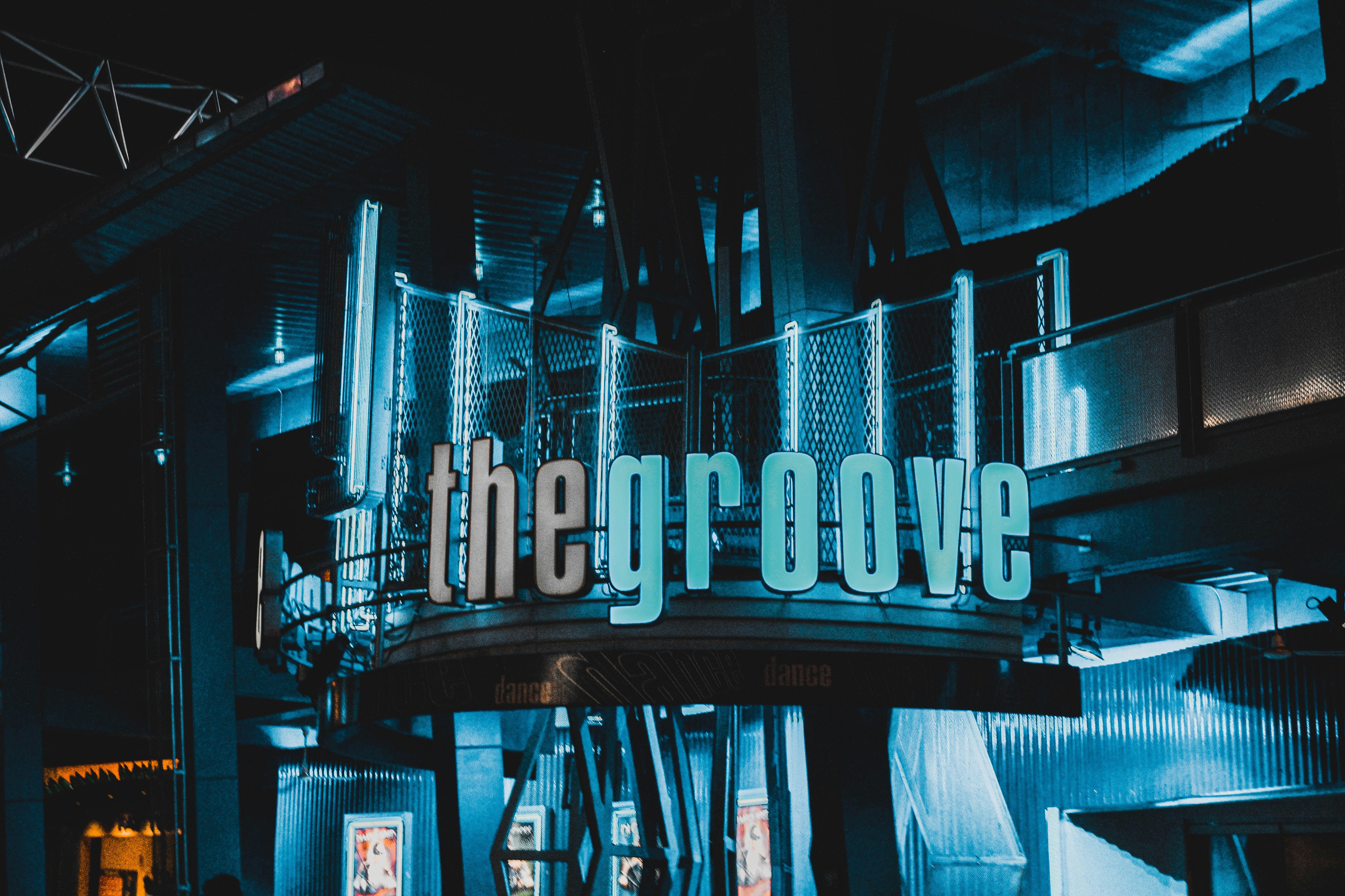 blue and white UNKs neon light signage