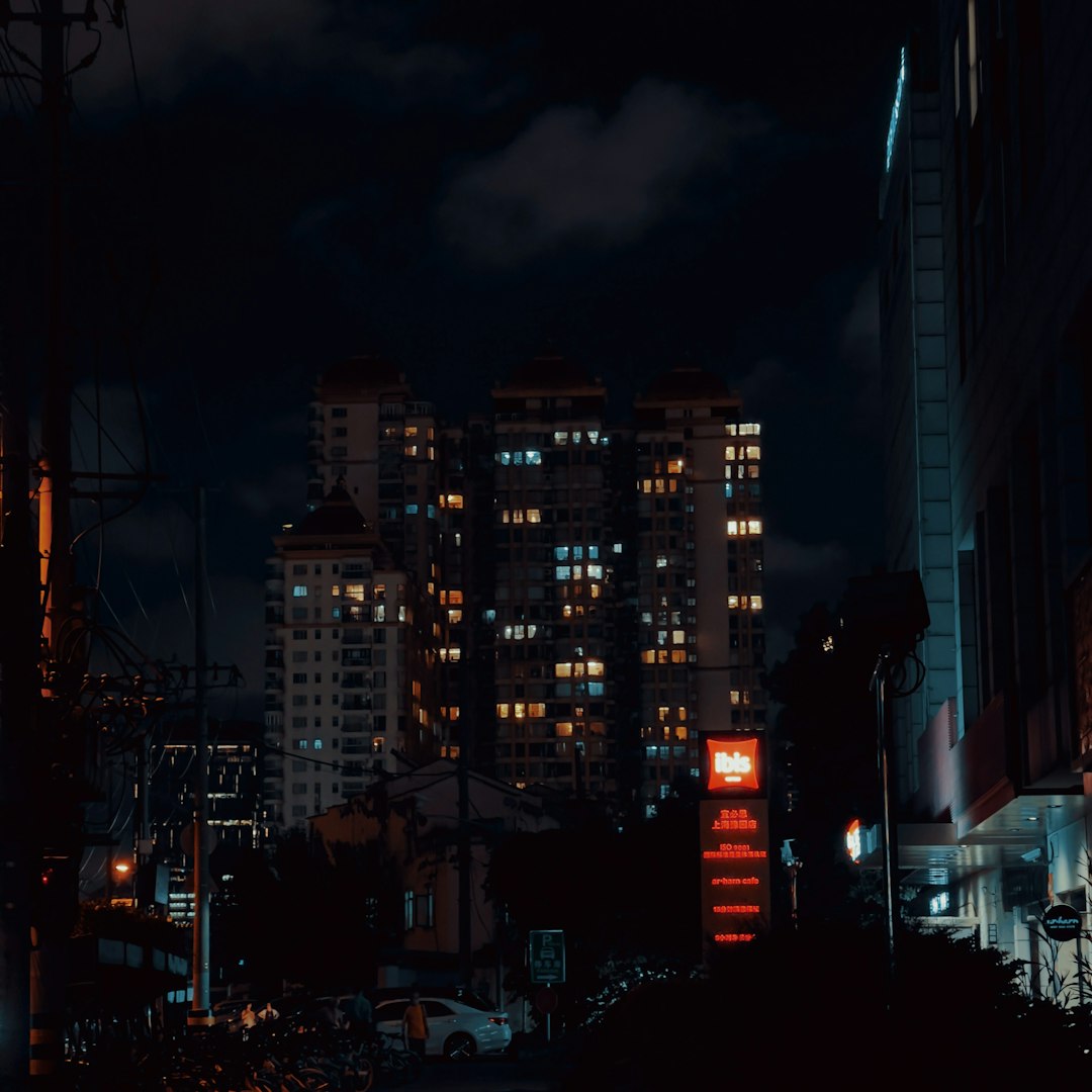 a city at night with a lot of buildings lit up